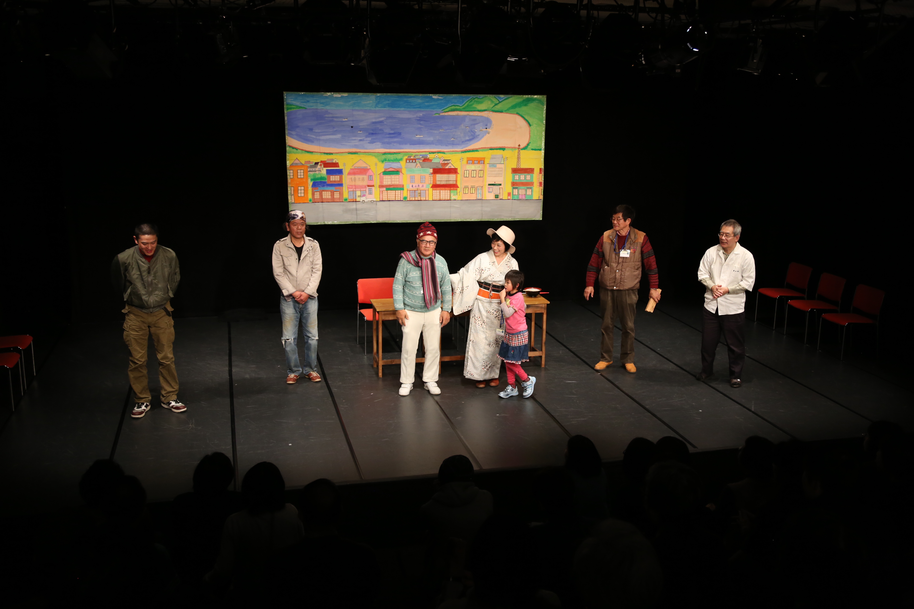 [Image 16: People from Kamagasaki performing by invitation at the 2016 BeSeTo Theater Festival in Tottori. On these trips buying souvenirs to bring back is a special pleasure because it shows they have someone to give them to]